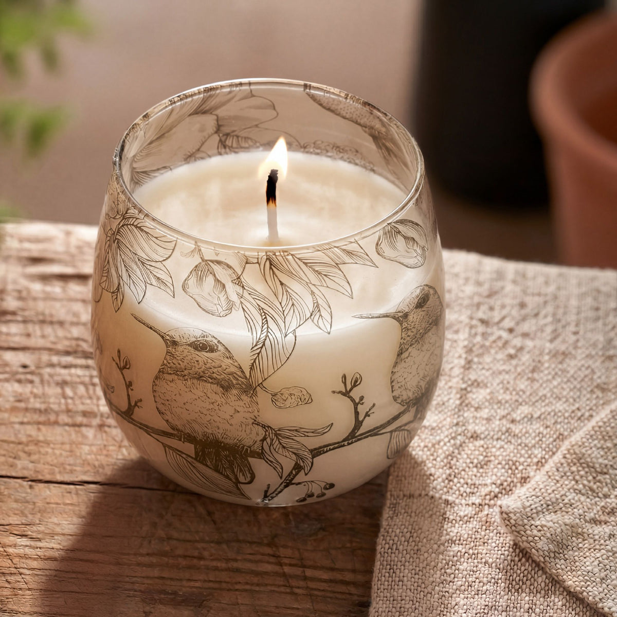 Medium Decorative Glass Jar Candle – Drawn by Flame product image 5, showing the distinctive design and materials